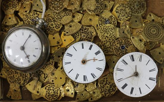 A silver pair cased pocket watch, two pocket watch movements and a quantity of watch cocks.